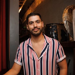 Headshot of ADAM MAMAWALA
