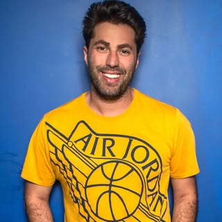 Headshot of Adam Ray