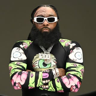 Headshot of 1200 Banksy